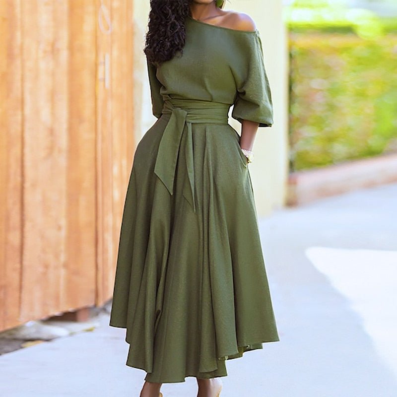 Robe femme en coton, taille cintrée, couleur unie, style classique et élégant pour toutes occasions.