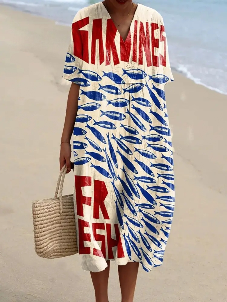 Robe fluide femme avec imprimé poissons vintage, élégance marine et silhouette flatteuse pour toutes occasions.