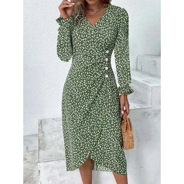 "Robe Isabelle fleurie élégante, motifs floraux colorés, manche courte, coupe ajustée féminine, idéale bureau ou soirée."