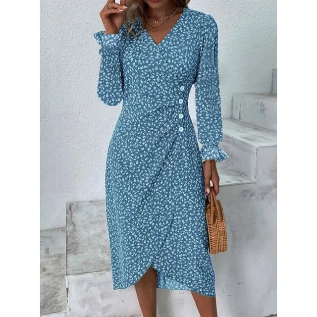 "Robe Isabelle fleurie élégante, motifs floraux colorés, manche courte, coupe ajustée féminine, idéale bureau ou soirée."