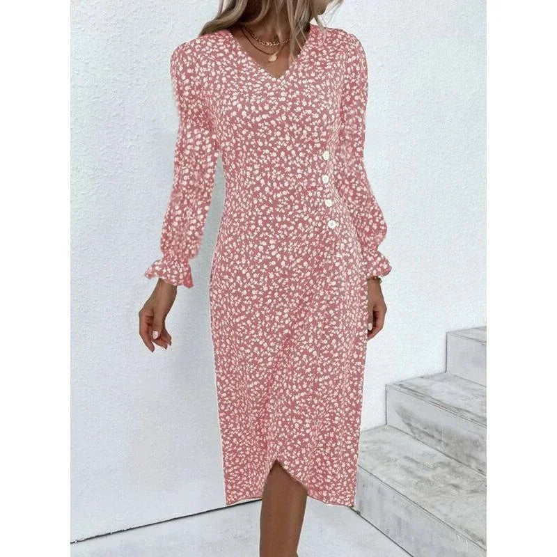 "Robe Isabelle fleurie élégante, motifs floraux colorés, manche courte, coupe ajustée féminine, idéale bureau ou soirée."