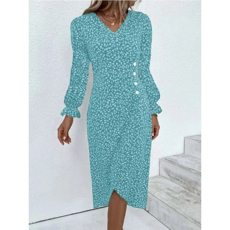 "Robe Isabelle fleurie élégante, motifs floraux colorés, manche courte, coupe ajustée féminine, idéale bureau ou soirée."
