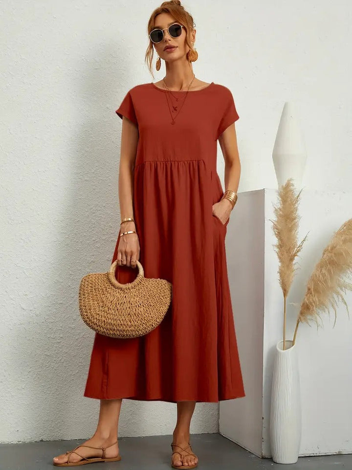 "Robe lin premium élégante avec poches, coupe flatteuse, couleurs variées, adaptée toutes saisons, confort assuré."