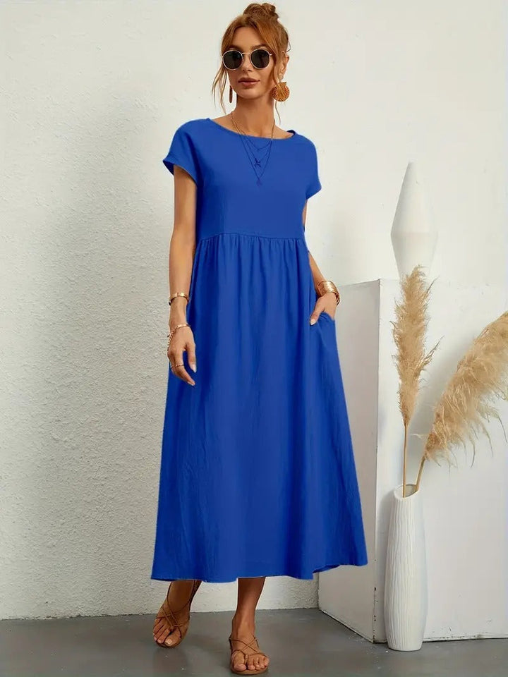 "Robe lin premium élégante avec poches, coupe flatteuse, couleurs variées, adaptée toutes saisons, confort assuré."
