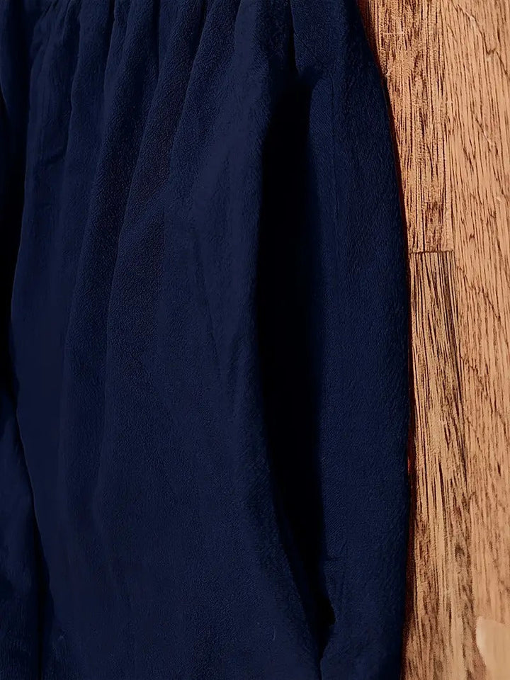 "Robe lin premium élégante avec poches, coupe flatteuse, couleurs variées, adaptée toutes saisons, confort assuré."