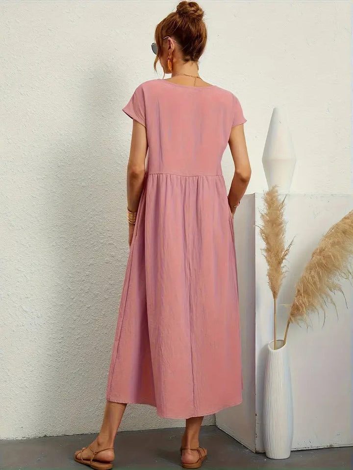 "Robe lin premium élégante avec poches, coupe flatteuse, couleurs variées, adaptée toutes saisons, confort assuré."
