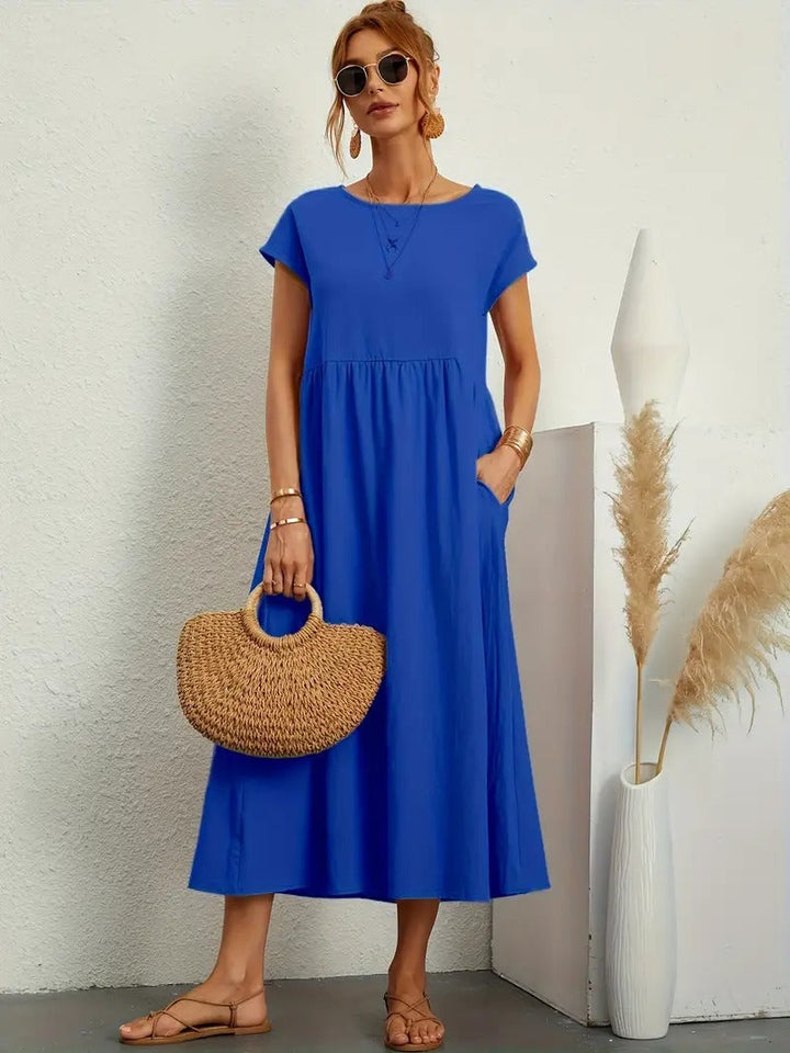 "Robe lin premium élégante avec poches, coupe flatteuse, couleurs variées, adaptée toutes saisons, confort assuré."