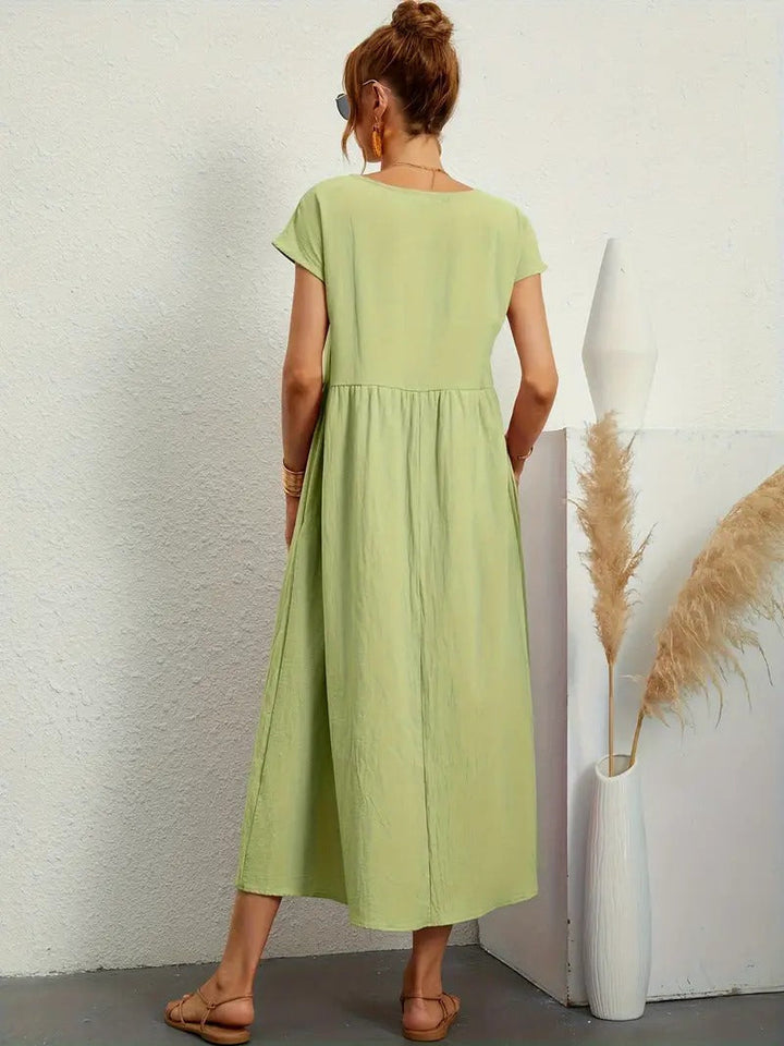 "Robe lin premium élégante avec poches, coupe flatteuse, couleurs variées, adaptée toutes saisons, confort assuré."