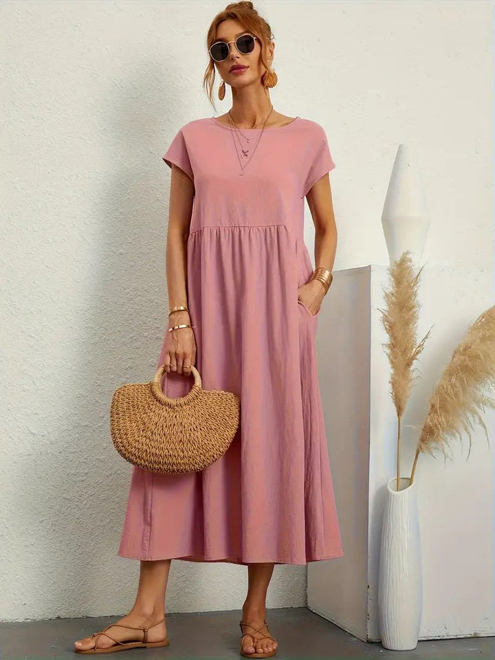"Robe lin premium élégante avec poches, coupe flatteuse, couleurs variées, adaptée toutes saisons, confort assuré."