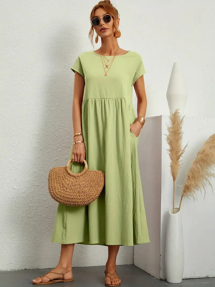 "Robe lin premium élégante avec poches, coupe flatteuse, couleurs variées, adaptée toutes saisons, confort assuré."