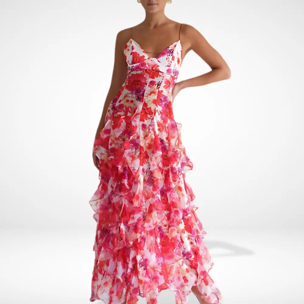 Robe longue à volants et motif floral, élégante et féminine, parfaite pour l'été, avec bretelles fines et volants superposés.