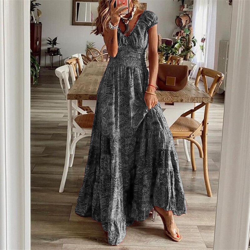 Robe longue bohème en tissu léger, coupe fluide, style chic décontracté. Idéale pour silhouette élégante et confort.