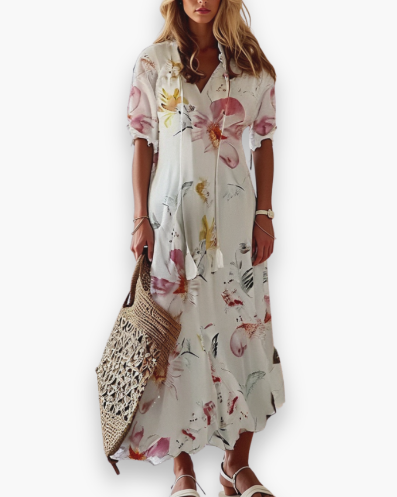 "Robe longue bohème femme, imprimé floral, élégante et fluide pour l'été, coupe ample, style romantique décontracté."