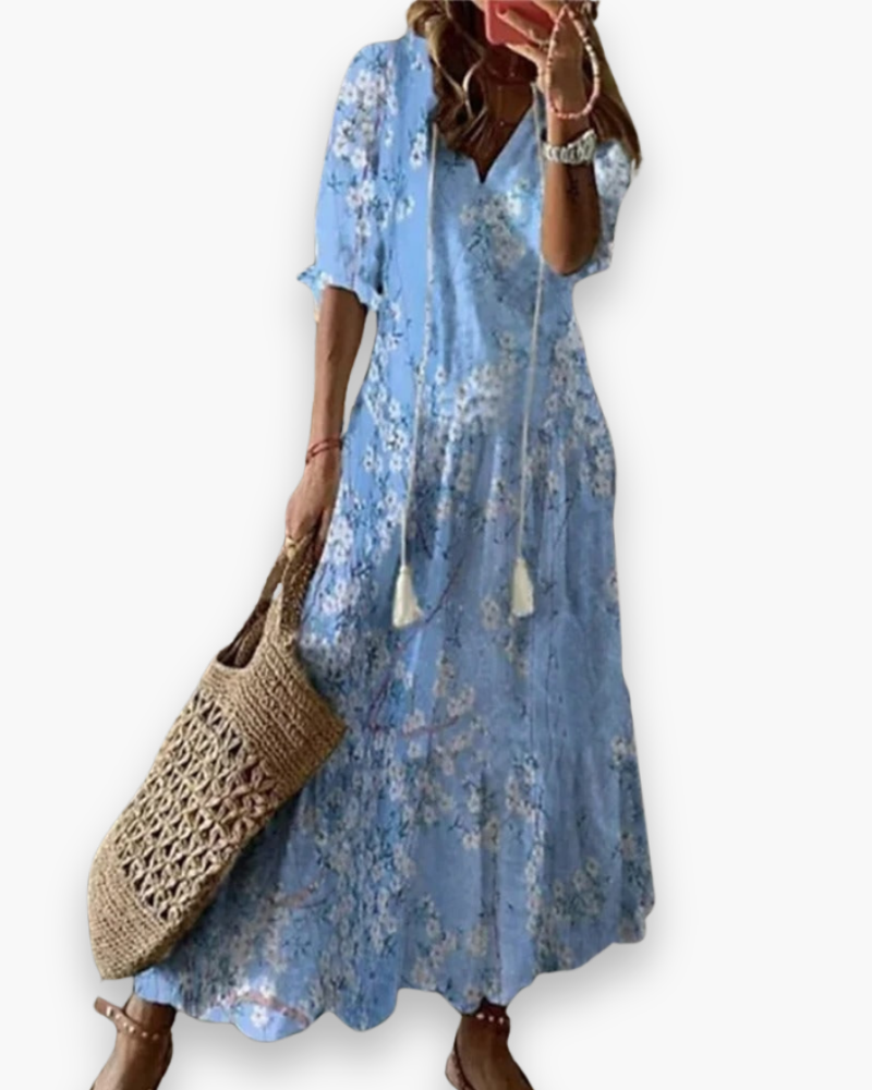 "Robe longue bohème femme, imprimé floral, élégante et fluide pour l'été, coupe ample, style romantique décontracté."