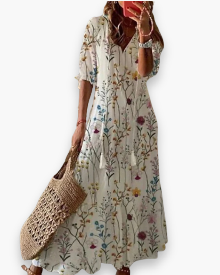 "Robe longue bohème femme, imprimé floral, élégante et fluide pour l'été, coupe ample, style romantique décontracté."