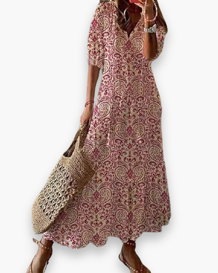 "Robe longue bohème femme, imprimé floral, élégante et fluide pour l'été, coupe ample, style romantique décontracté."