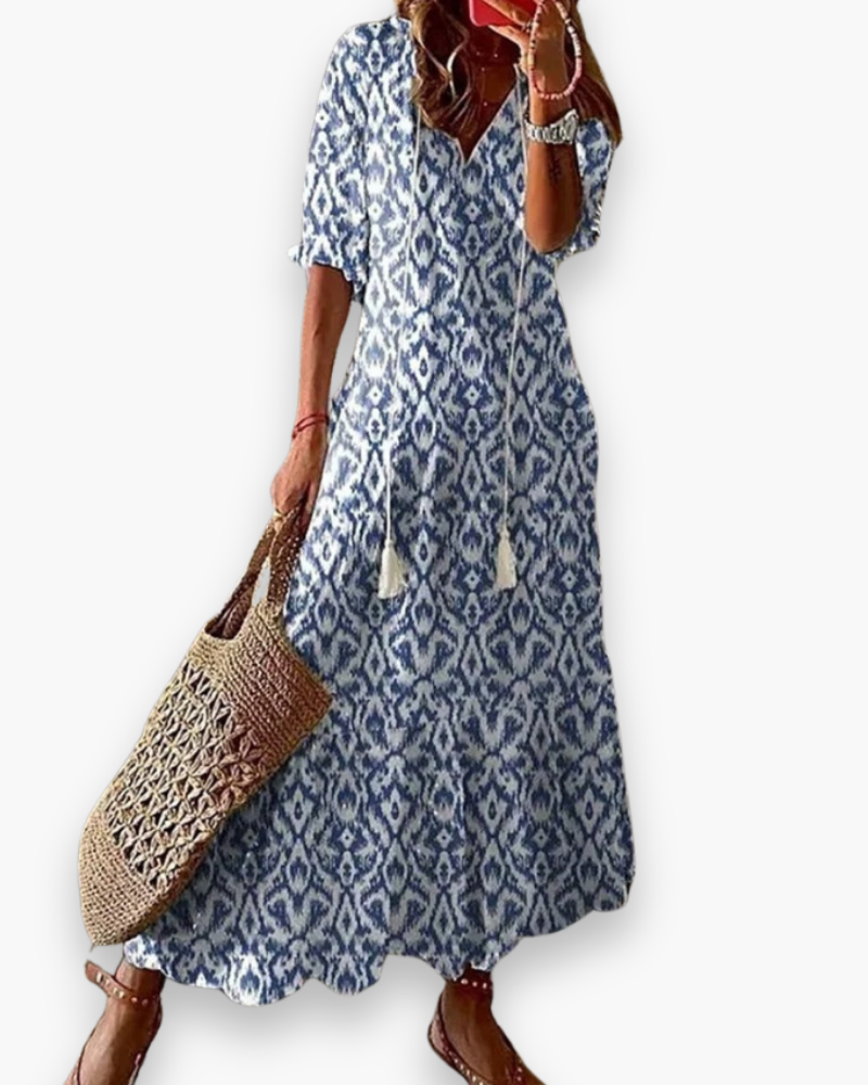 "Robe longue bohème femme, imprimé floral, élégante et fluide pour l'été, coupe ample, style romantique décontracté."