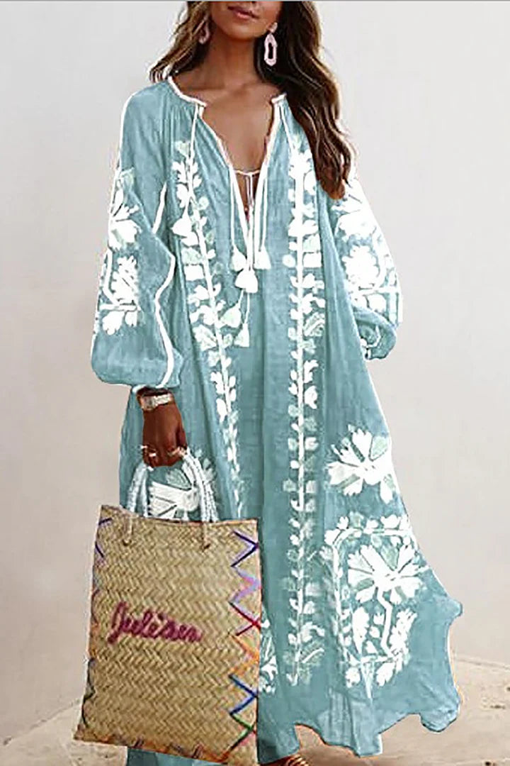 "Robe longue bohème, imprimé floral éclatant, disponible en plusieurs couleurs, style estival et fluide, tailles S à 5XL."