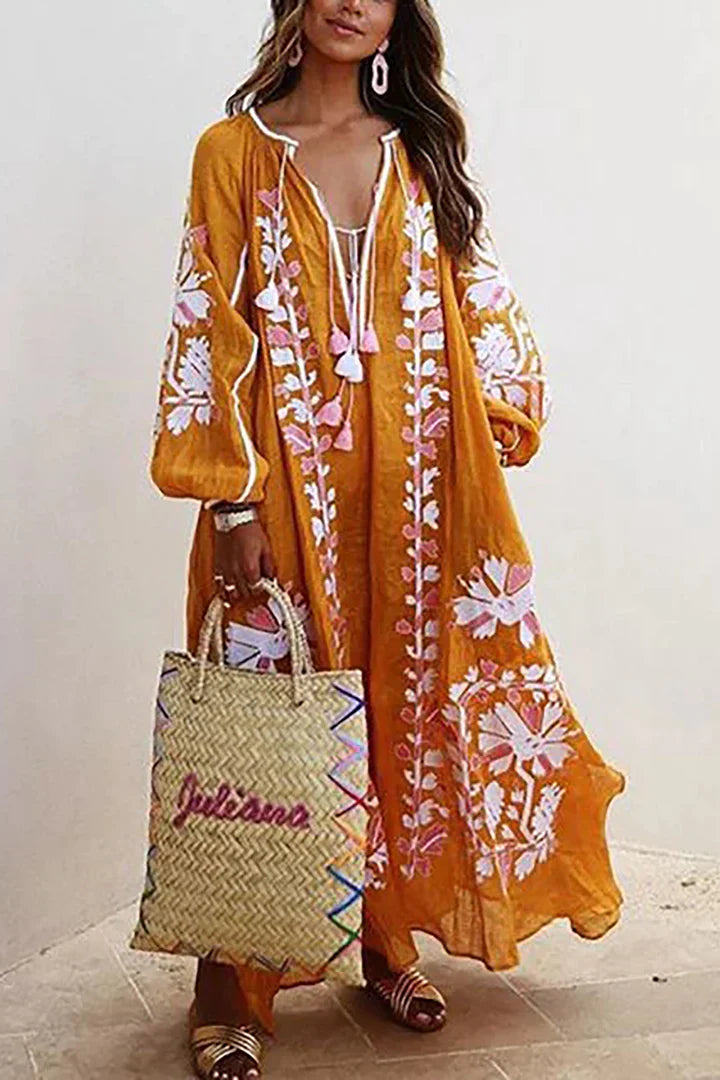 "Robe longue bohème, imprimé floral éclatant, disponible en plusieurs couleurs, style estival et fluide, tailles S à 5XL."