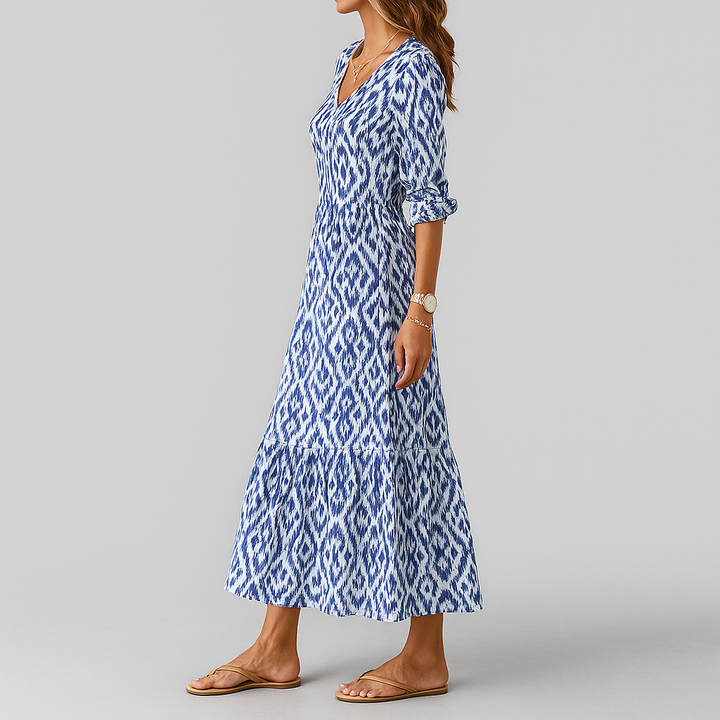 Robe longue bohème imprimé ikat femme, style décontracté, col V, manches 3/4, silhouette fluide, élégance estivale.