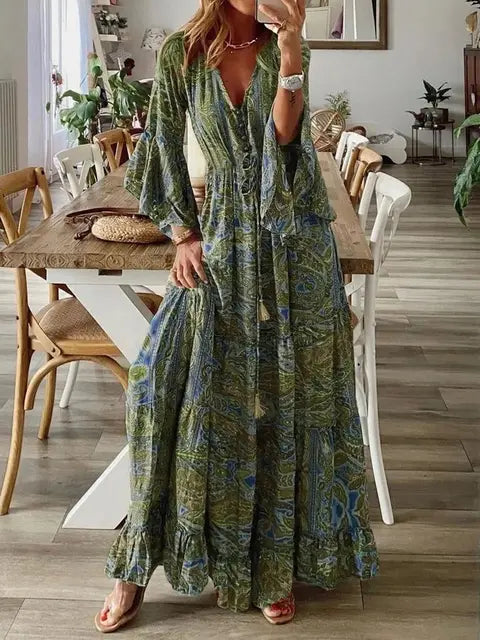 "Robe longue bohémienne chic d'été, manches évasées, motifs floraux, taille haute flatteuse, col en V élégant."