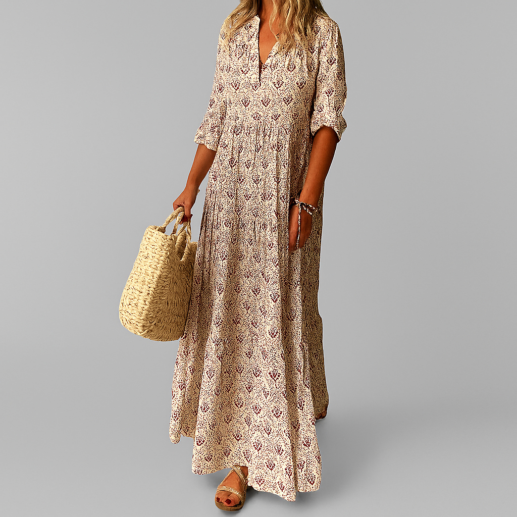 Robe longue en coton avec imprimé vintage, idéale pour l'été; silhouette maxi fluide et manches 3/4 pour élégance décontracté