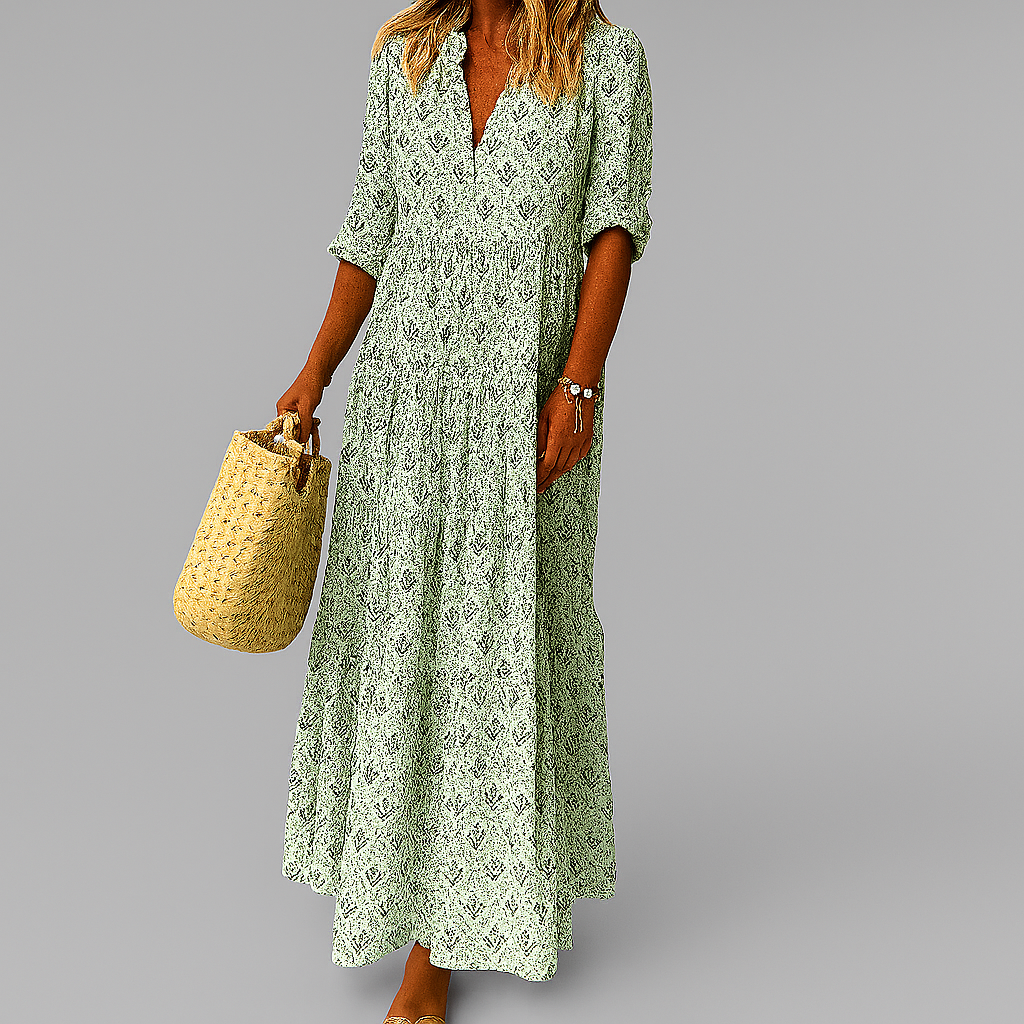 Robe longue en coton avec imprimé vintage, idéale pour l'été; silhouette maxi fluide et manches 3/4 pour élégance décontracté