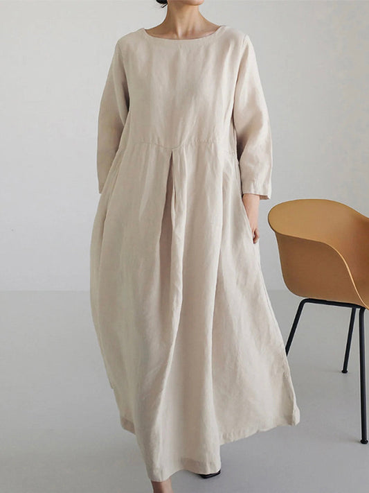 "Robe longue en lin beige, coupe ample idéale pour été, style décontracté et élégant avec manches 3/4, parfait pour femmes."