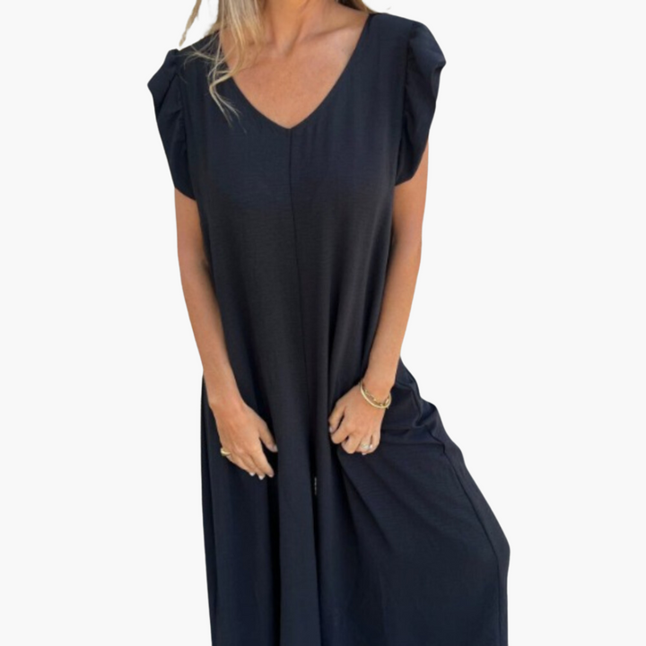 "Robe longue femme élégante, imprimé léopard tendance, V-Col flatteur, silhouette féminine, matière douce et confortable."