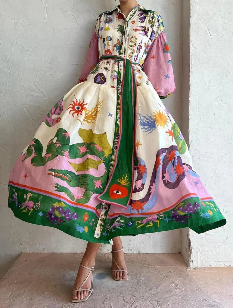Robe longue maxi femme Merle avec motifs multicolores, silhouette élégante, allure méditerranéenne chic et fluide.