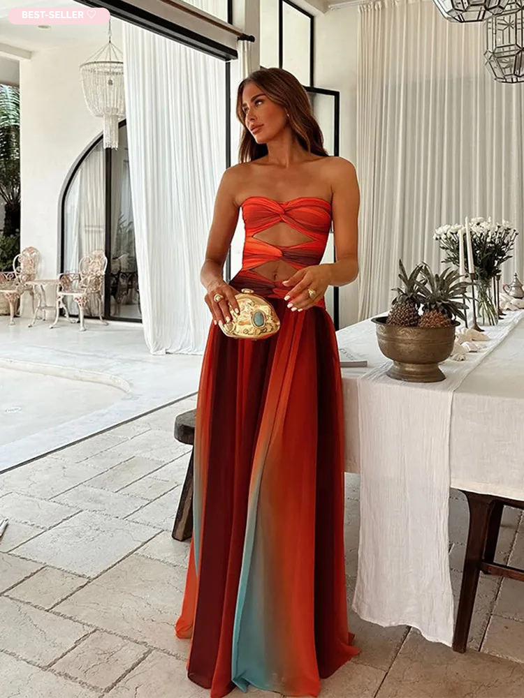 "Robe longue Maya Sunset élégante avec dégradé vibrant inspiré des couchers de soleil, parfait pour moments inoubliables."