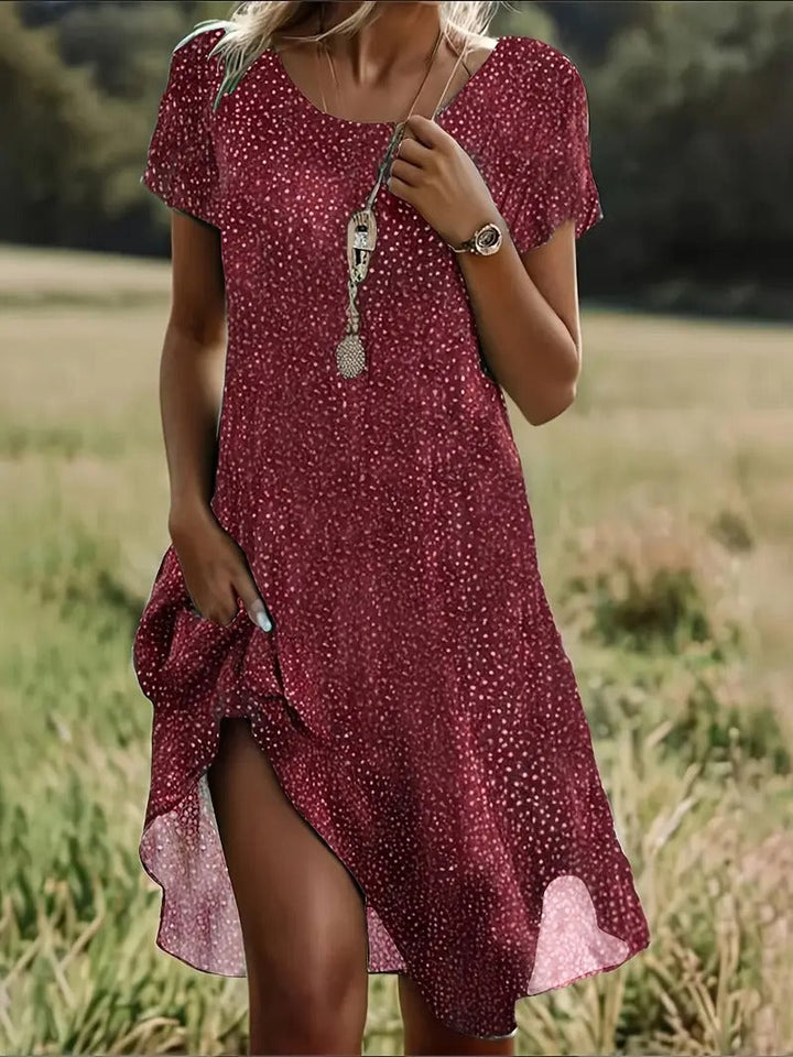 "Robe Maëlle, mini d'été chic pour femme, coupe confortable et légère, parfaite pour journées ensoleillées."