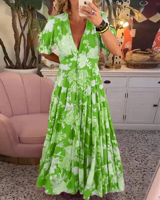 "Robe maxi évasée col V, imprimé floral vibrant, manches bouffantes, style chic et élégant pour femme"