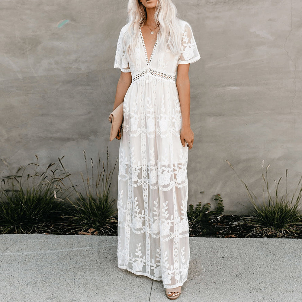 "Robe maxi Jasmine élégante, vue avant, coupe fluide, décolleté en V, tissu floral, parfaite pour journée ou soirée."