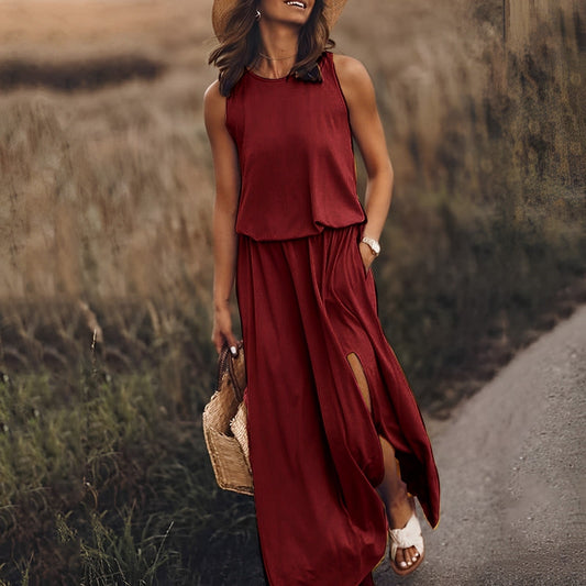 "Robe maxi JONNA sans manches, élégante et colorée, style rétro, tissu léger et fluide pour un look sophistiqué."