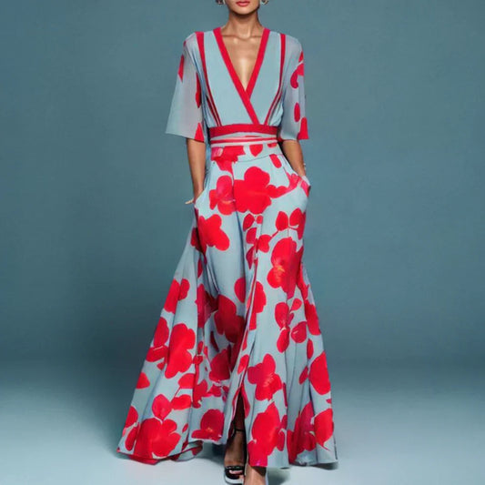 "Robe maxi longue élégante à imprimé floral vibrant, col en V et manches trois-quarts, tissu léger et respirant."