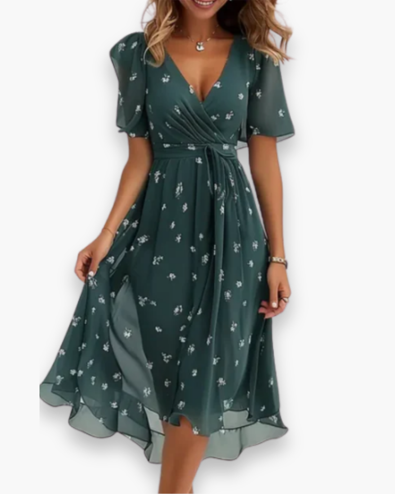 "Robe mi-longue chic évasée pour femme, col en V, manches légères, tissu fluide, élégance estivale."