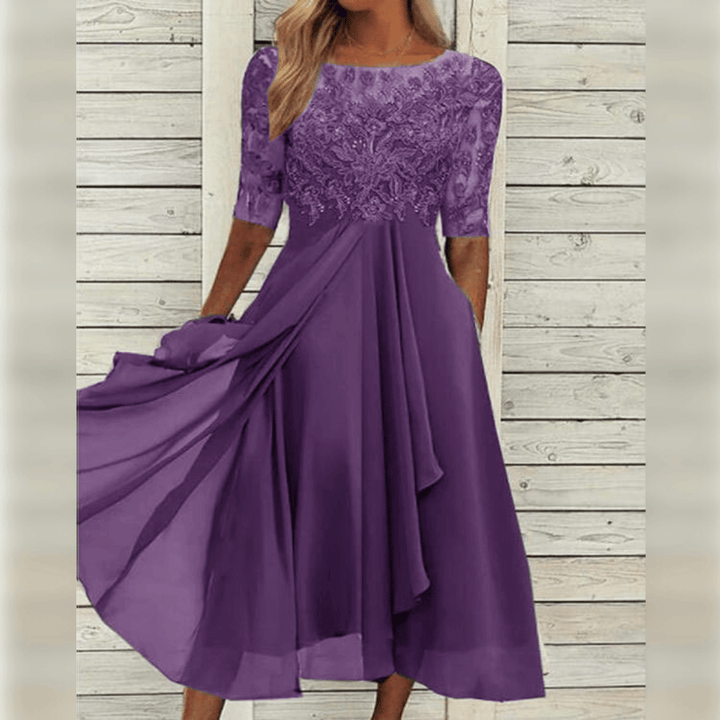 "Robe mi-longue élégante avec broderies délicates, idéale pour invités de mariage, style raffiné et chic, disponible en plusi
