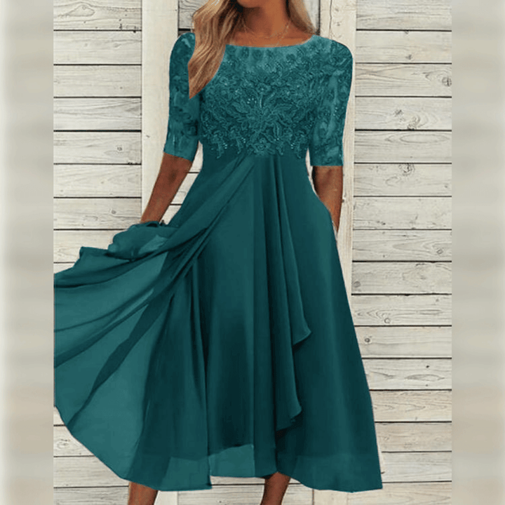 "Robe mi-longue élégante avec broderies délicates, idéale pour invités de mariage, style raffiné et chic, disponible en plusi