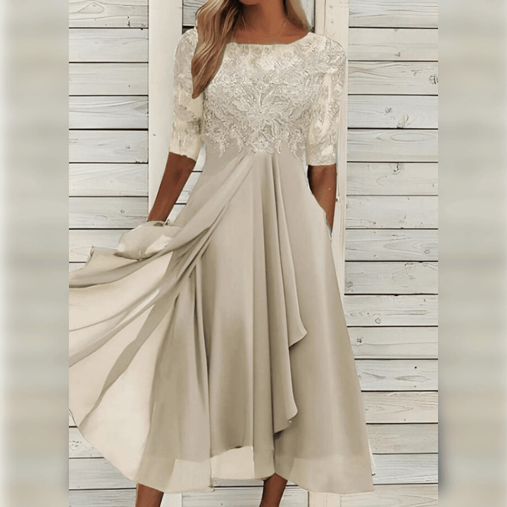 "Robe mi-longue élégante avec broderies délicates, idéale pour invités de mariage, style raffiné et chic, disponible en plusi