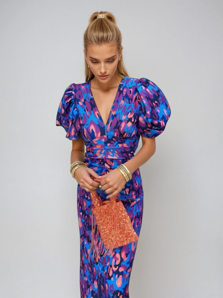 "Robe mi-longue imprimée florale avec manches bouffantes, élégante pour femme, idéale occasions spéciales."