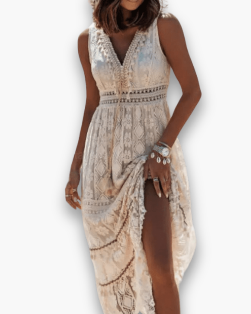 Robe midi bohème chic beige avec dentelle délicate, style élégant et coupe fluide mettant en valeur la silhouette féminine.
