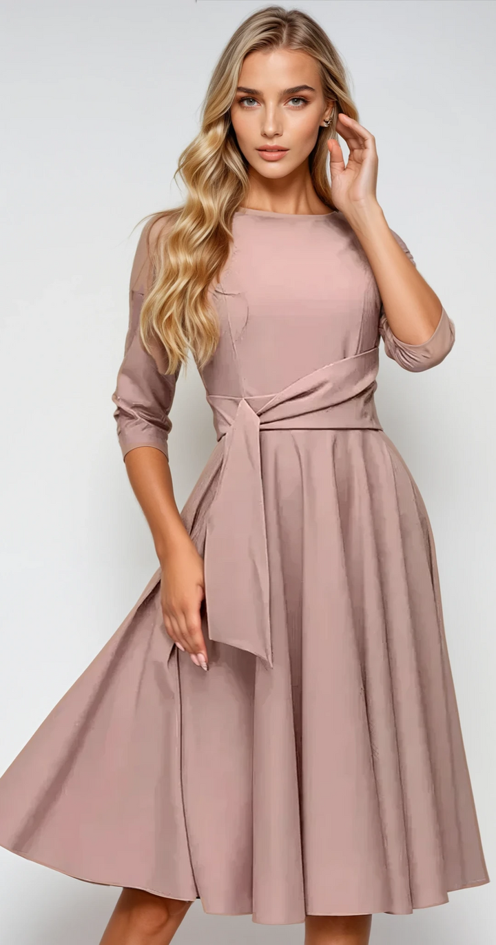 Robe midi élégante avec détails de nœuds, tissu léger et fluide, convenant pour occasions formelles ou décontractées.