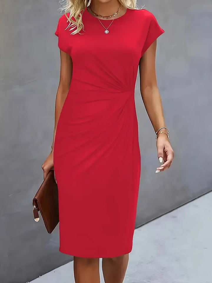 "Robe midi élégante cintrée pour femme, col rond, longueur formelle, sublimant la silhouette et convenant aux occasions"