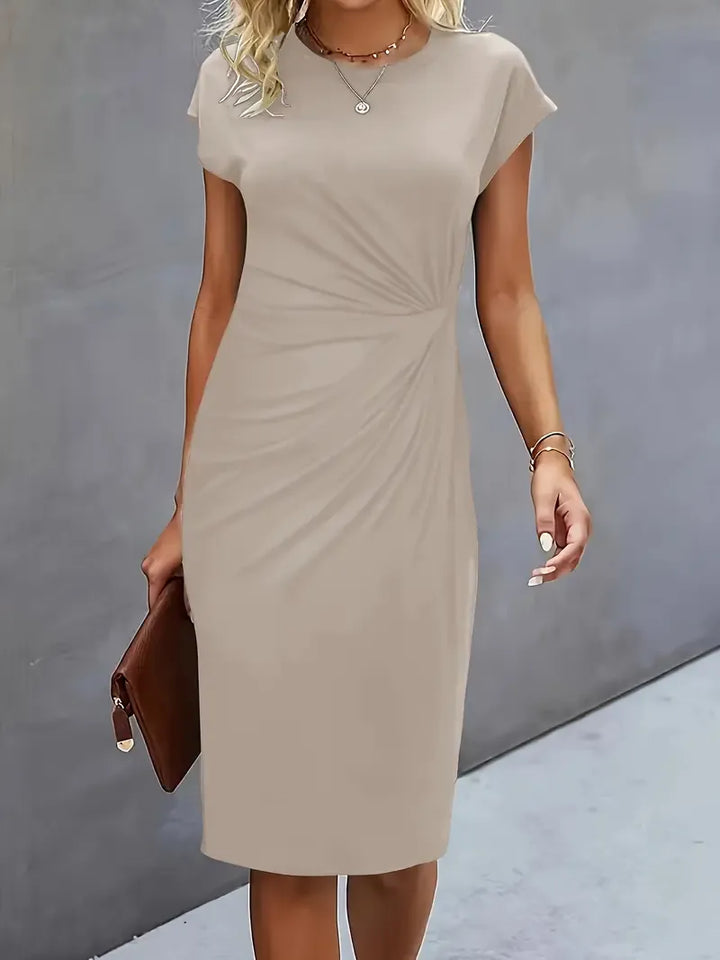 "Robe midi élégante cintrée pour femme, col rond, longueur formelle, sublimant la silhouette et convenant aux occasions"