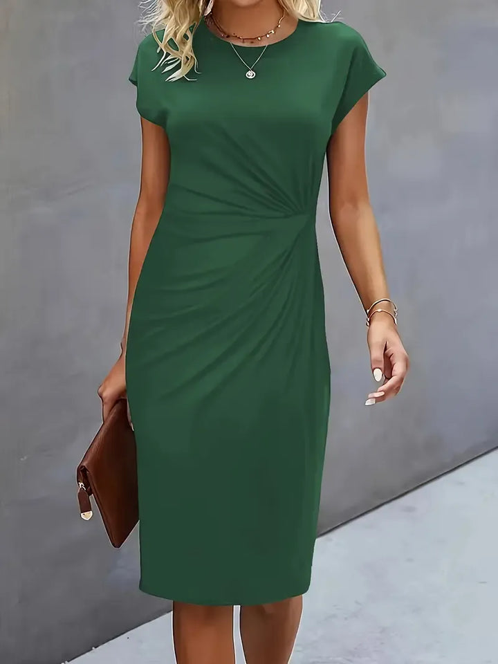 "Robe midi élégante cintrée pour femme, col rond, longueur formelle, sublimant la silhouette et convenant aux occasions"