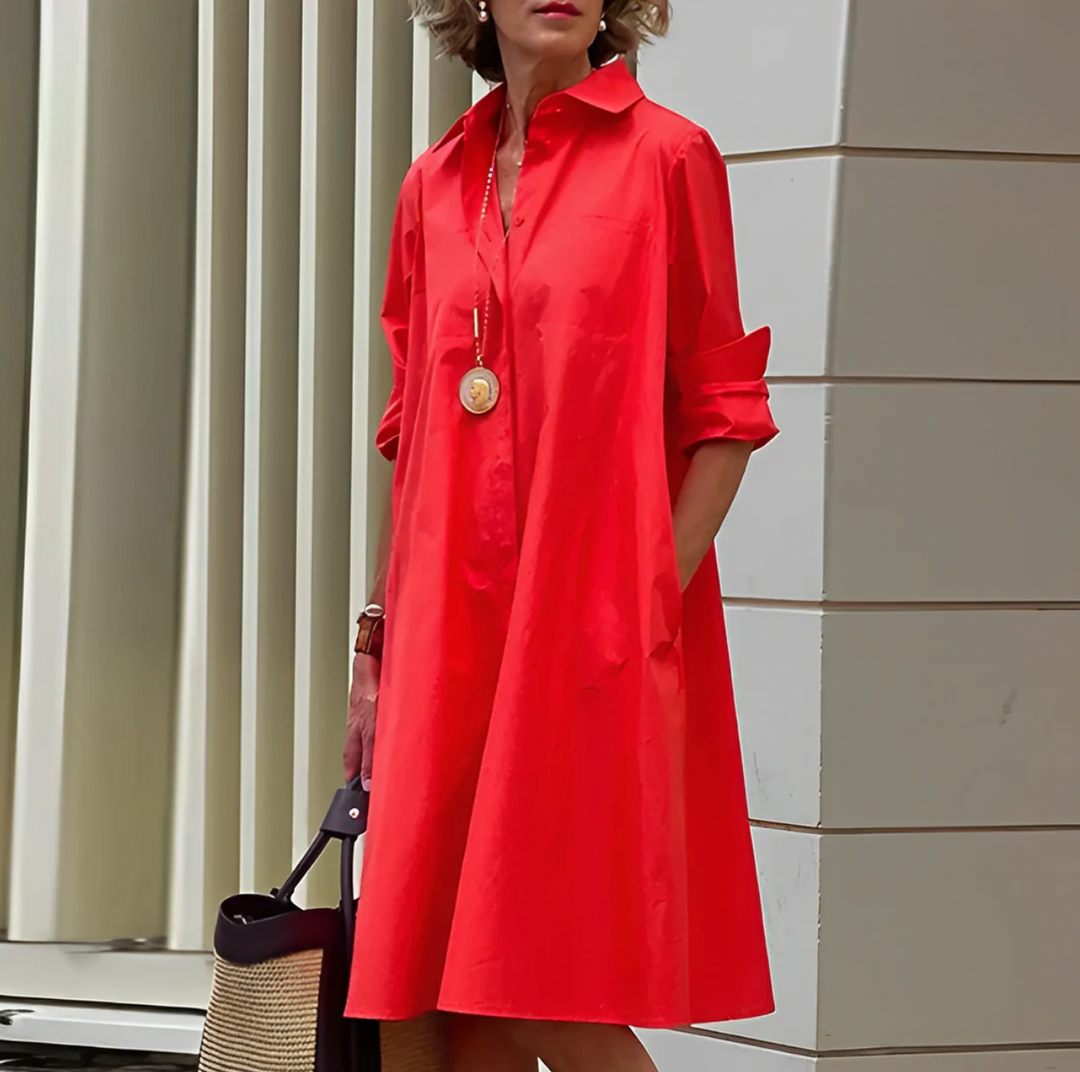 "Robe midi élégante d'été en tissu léger, coupe cintrée, couleur vibrante, parfaite pour confort et style."