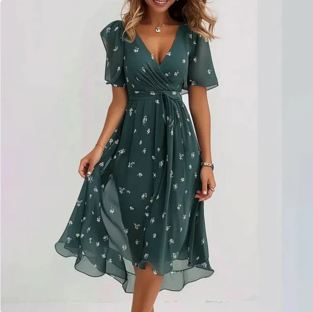 "Robe midi élégante femme, décolleté en V, couleur noire, idéale pour soirées spéciales, silhouette flatteuse et moderne."