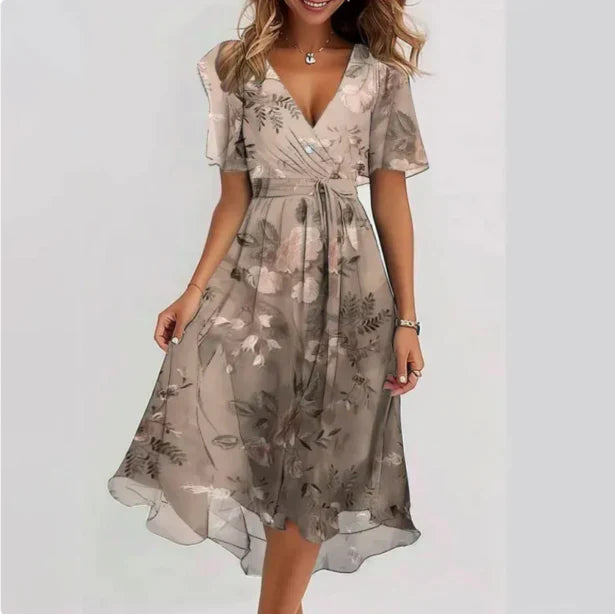 "Robe midi élégante femme, décolleté en V, couleur noire, idéale pour soirées spéciales, silhouette flatteuse et moderne."