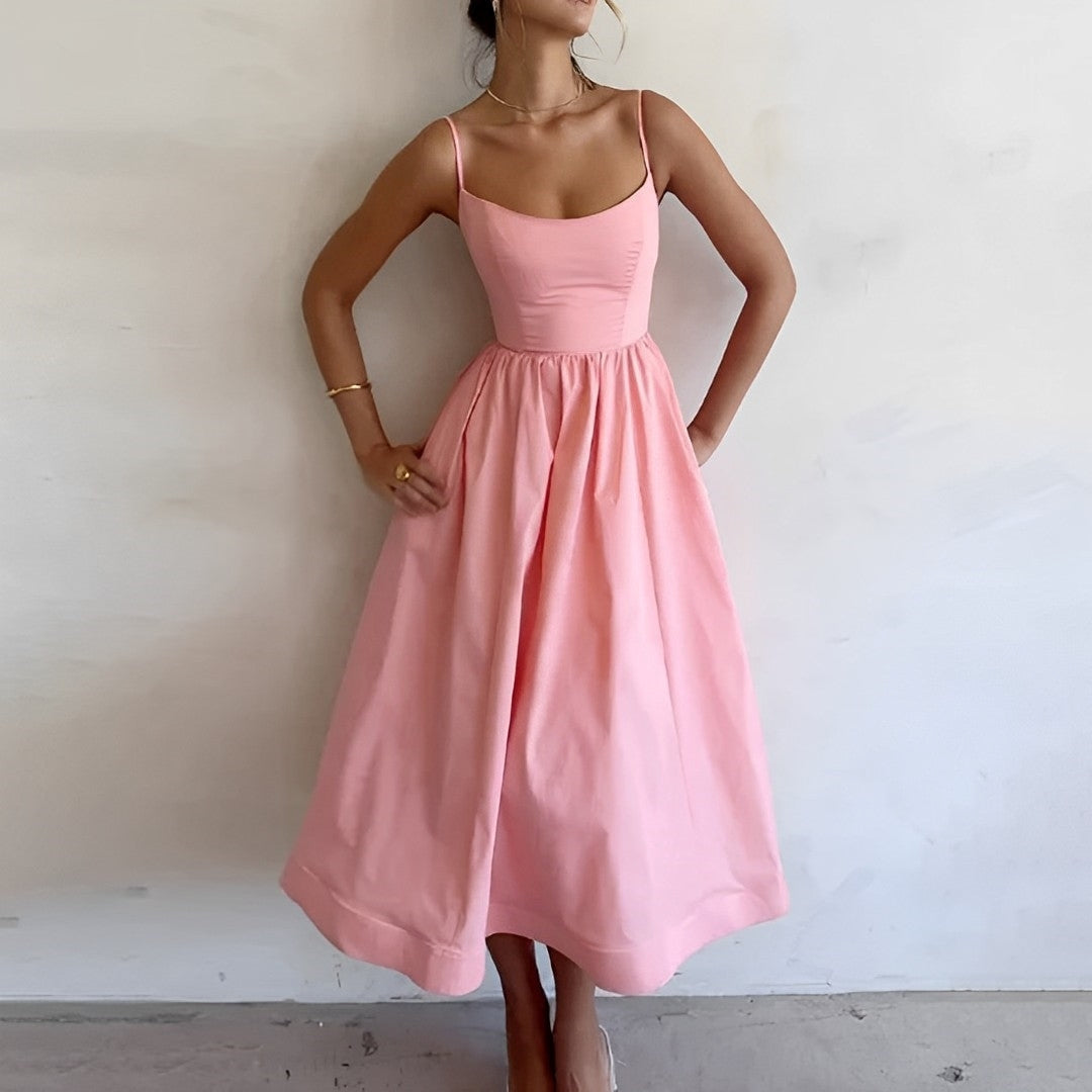 "Robe midi élégante pour femmes, sans manches, jupe fluide A-line, style chic et raffiné, parfaite pour toutes occasions."